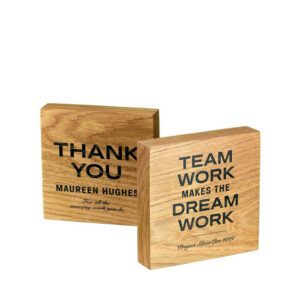 message-engraved-on-squared-wooden-block