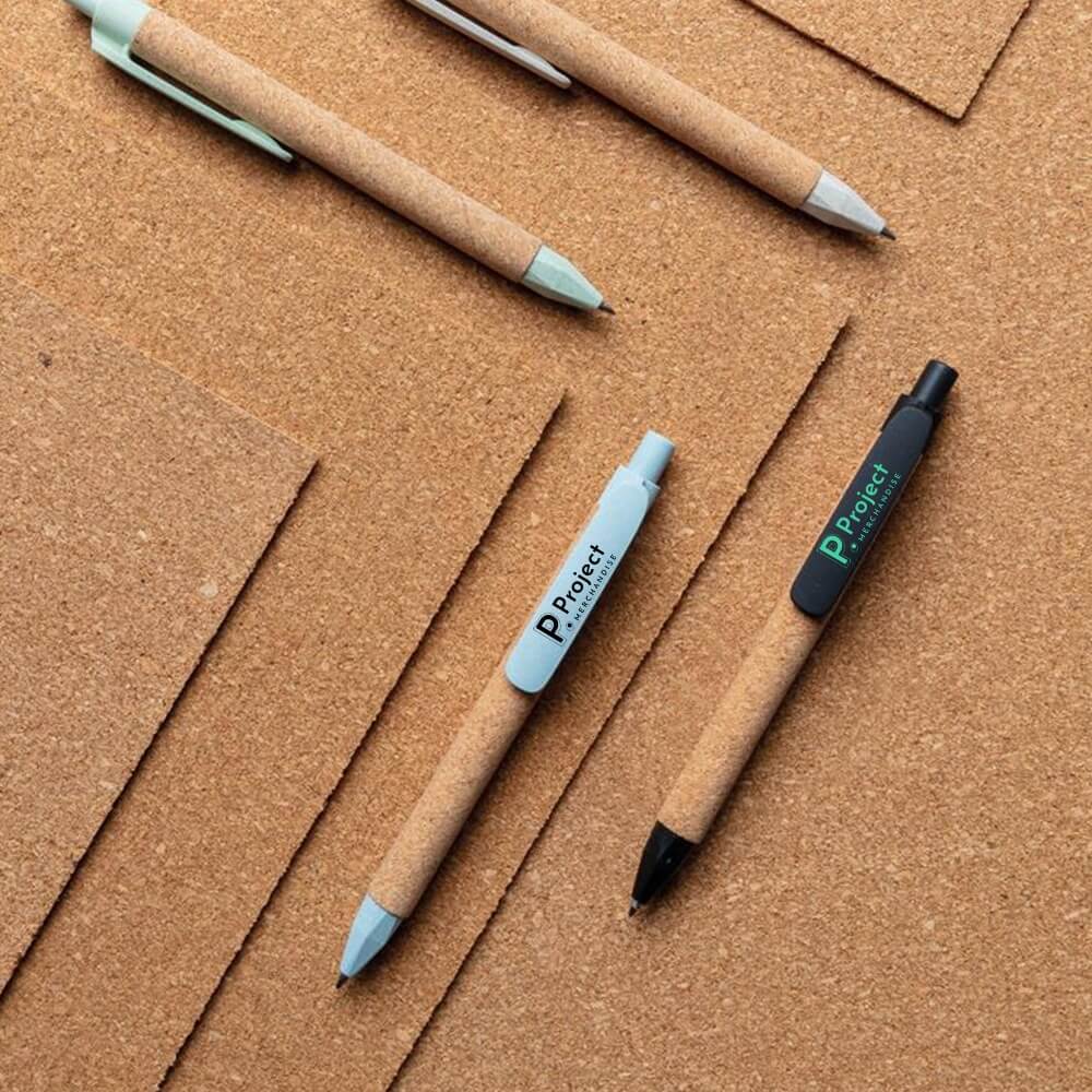 Sustainable Merch Ideas for New & Returning Employees 6 sustainable-cork-pens-on-matching-cork-background